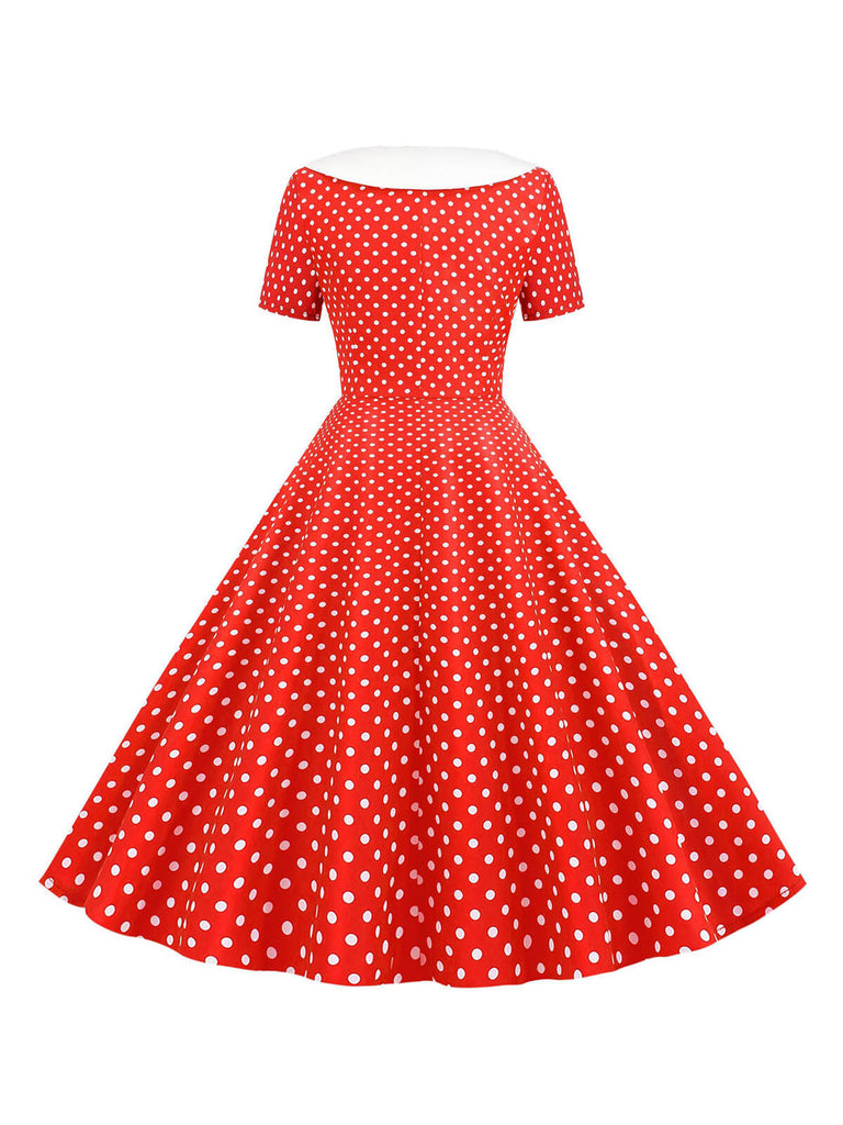 She slips into this 1950s Polka Dot Patchwork Lapel Dress and suddenly it's a 1950s daydream