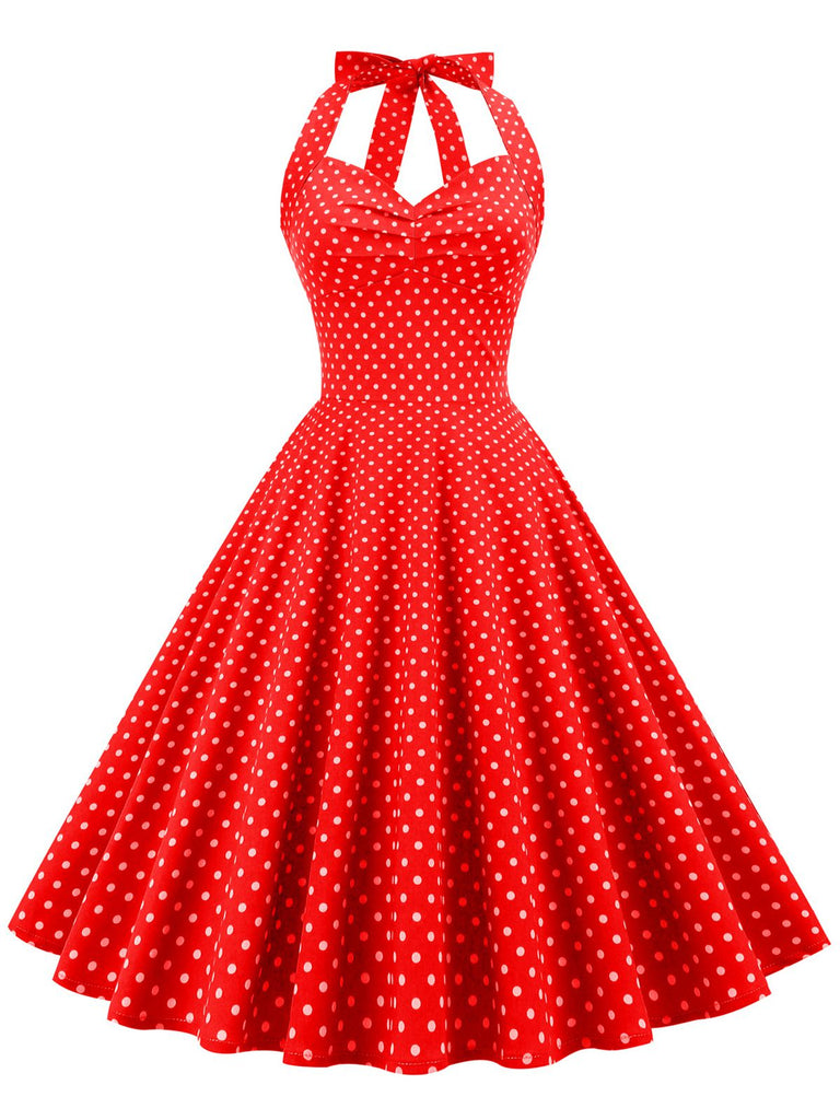 She slips into this 1950s Polka Dots Lace Up Halter Swing Dress and suddenly it's a 1950s daydream