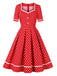 She slips into this 1950s Polka Dots Patchwork Swing Dress and suddenly it's a 1950s daydream