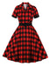 This 1950s Retro Contrast Short-Sleeved Lapel Dress wraps her in 1950s elegance, one twirl at a time