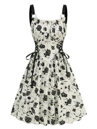 She slips into this 1950s Roses Straps Lace-Up Pleated Dress and suddenly it's a 1950s daydream