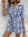 She pairs this 1950s Shirt Neck Print Belted Romper with confidence and 1950s charm