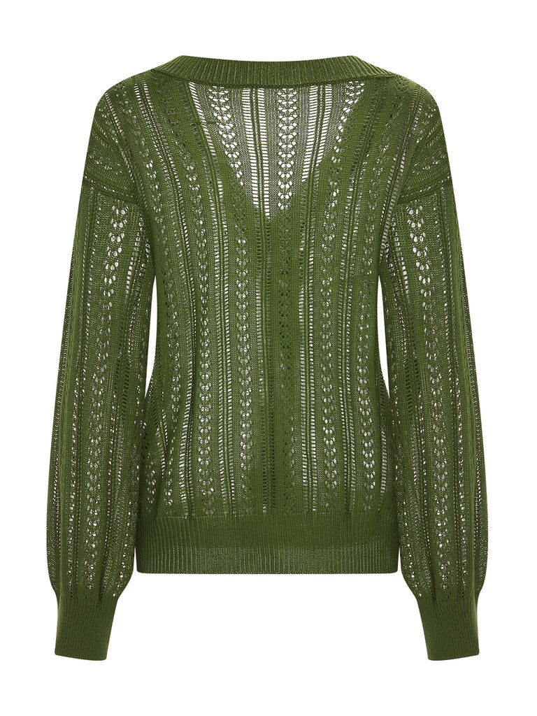 She finds her 1950s story in this 1950s Solid Crochet Hollow Knitted Cardigan