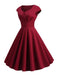 She slips into this 1950s Solid Heart Neck Short Sleeve Dress and suddenly it's a 1950s daydream
