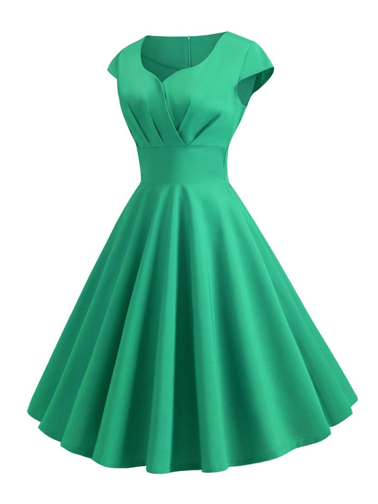 This 1950s Solid Heart Neck Short Sleeve Dress wraps her in 1950s elegance, one twirl at a time