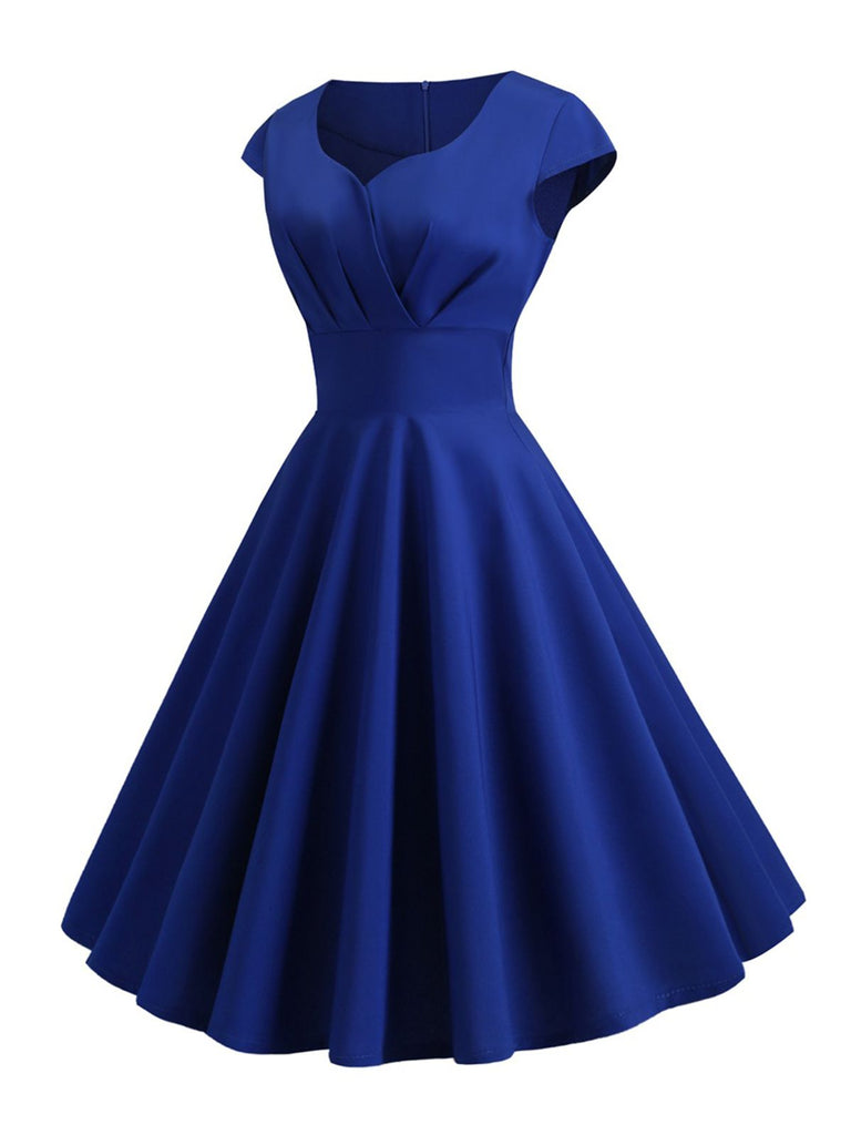 This 1950s Solid Heart Neck Short Sleeve Dress wraps her in 1950s elegance, one twirl at a time