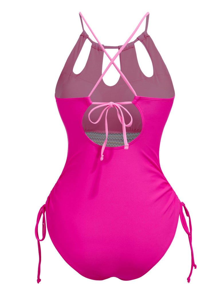 She's wearing 1950s Solid Keyhole Collar Cross-Bind Swimsuit and the whole beach remembers the 1950s