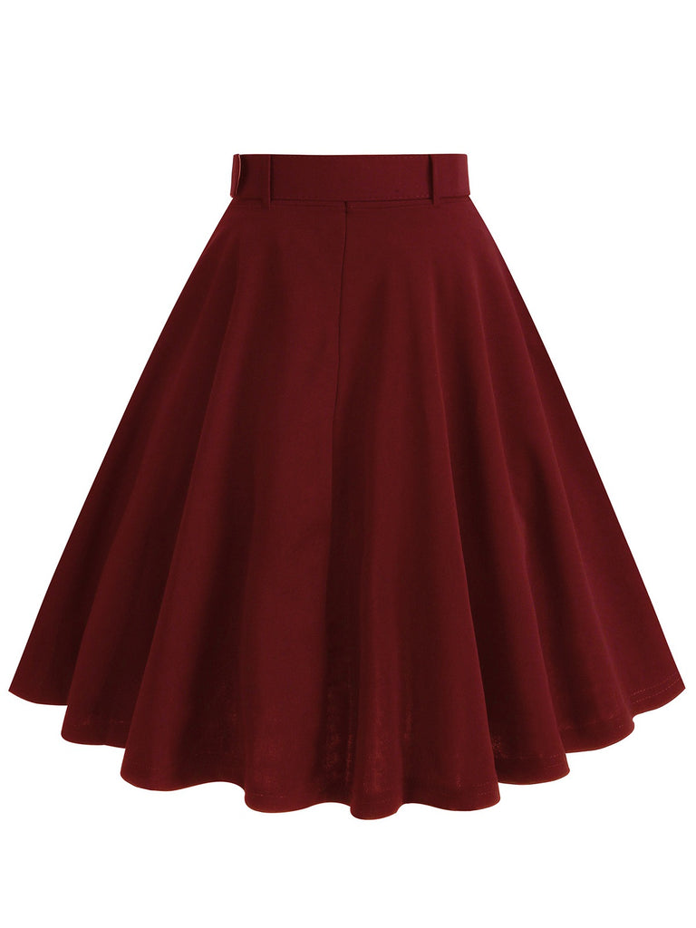 This 1950s Solid Pleated Button Belted Skirt spins 1950s stories with every step