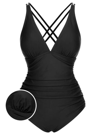 She's wearing 1950s Solid V-Neck One-Piece Swimsuit and the whole beach remembers the 1950s