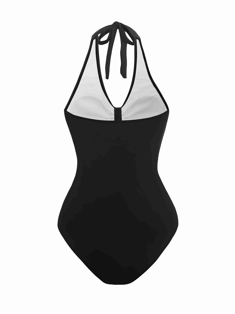 She's wearing 1950s Solid V-Neck Ruched Halter One-Piece Swimsuit and the whole beach remembers the 1950s