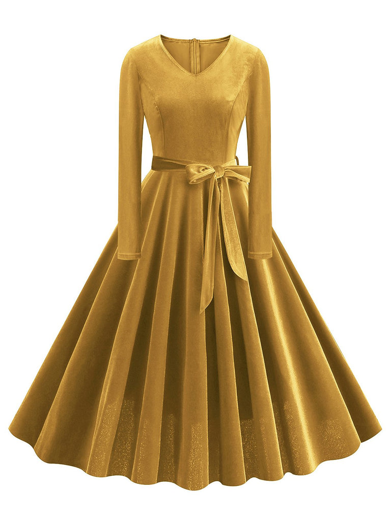 She slips into this 1950s Solid Velvet V-Neck Swing Dress and suddenly it's a 1950s daydream