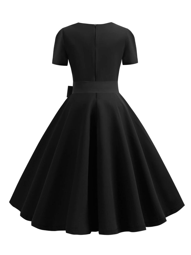This 1950s Square Neck Short Sleeves Dress wraps her in 1950s elegance, one twirl at a time