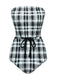 She's wearing 1950s Strapless Plaids One-Piece Swimsuit and the whole beach remembers the 1950s