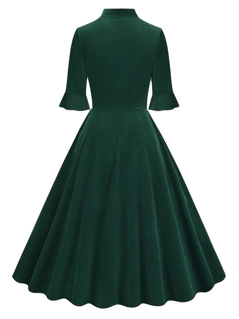 1950s Tie Neck Velvet Flared Sleeve Dress — a 1950