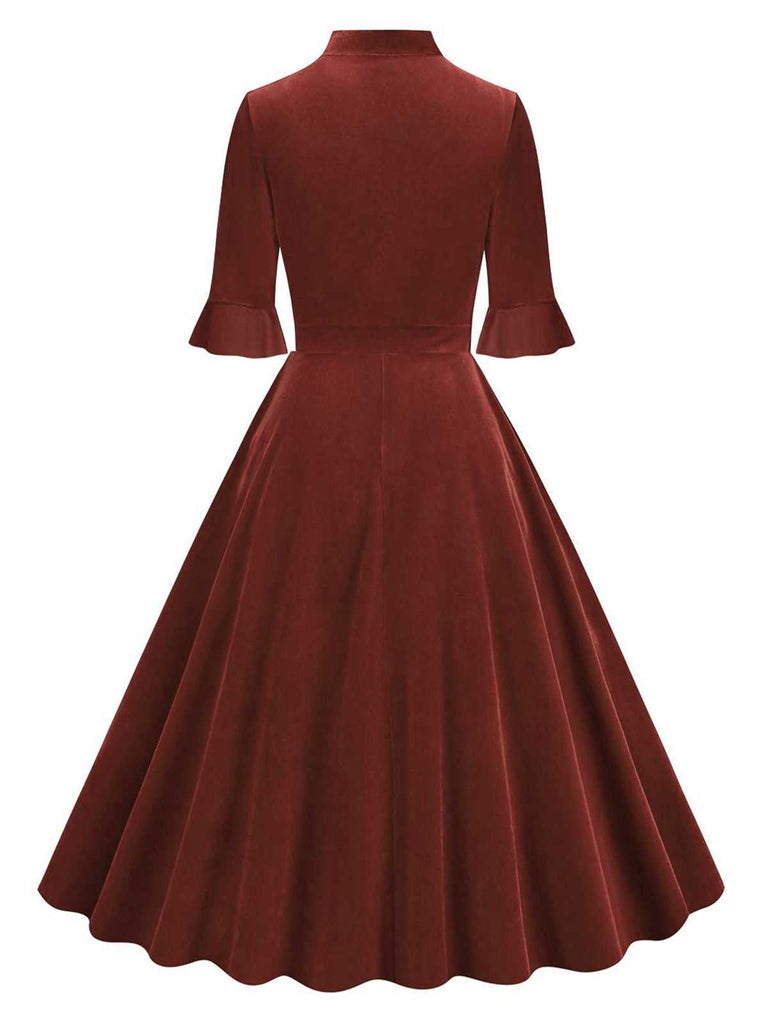This 1950s Tie Neck Velvet Flared Sleeve Dress wra