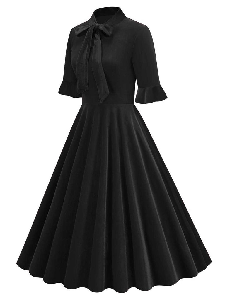 1950s Tie Neck Velvet Flared Sleeve Dress — a 1950