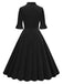 She slips into this 1950s Tie Neck Velvet Flared S