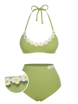 She's wearing 1960s Halter Knit Daisy Swimsuit and the whole beach remembers the 1960s