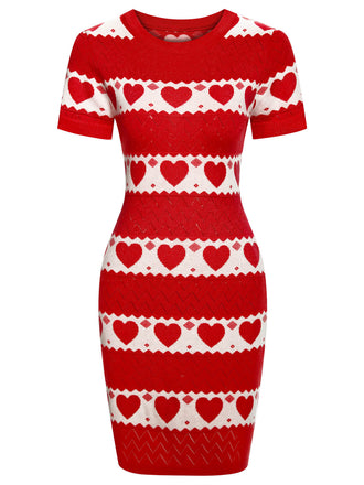 She slips into this 1960s Heart Short Sleeved Knitted Dress and suddenly it's a 1960s daydream