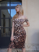She slips into this 1960s Off-shoulder Leopard Pencil Dress and suddenly it's a 1960s daydream