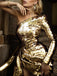 She slips into this 1960s Sequined One-Shoulder Pleated Dress and suddenly it's a 1960s daydream