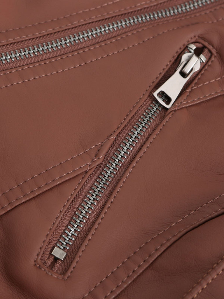 She throws on this 1960s Solid Faux Leather Motorcycle Jacket and the city feels like 1960s Paris