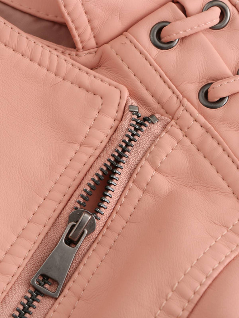 She throws on this 1960s Solid Faux Leather Motorcycle Jacket and the city feels like 1960s Paris