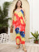 She slips into this 1960s Spaghetti Strap Floral Tulip Dress and suddenly it's a 1960s daydream