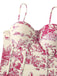 This 1960s Vintage Ink Floral Swimsuit & Cover-Up carries 1960s vacation dreams in every stitch