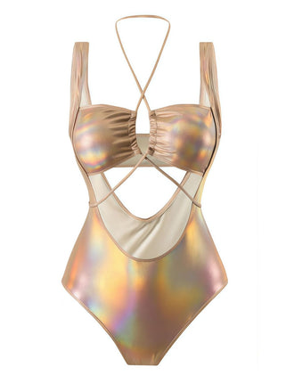 She's wearing 1970s Halter Cut-Out Metallic One-Piece Swimsuit and the whole beach remembers the 1970s