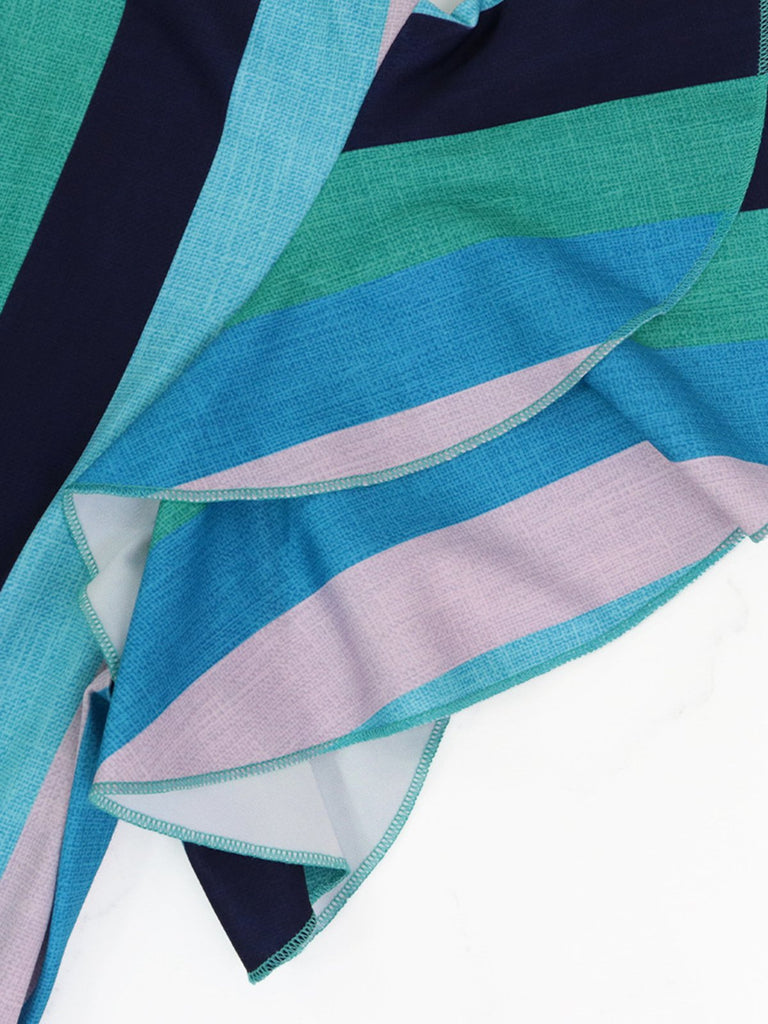 She slips into this 1970s Roman Stripes Ruffle Sleeve Dress and suddenly it's a 1970s daydream