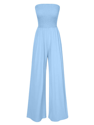 She finds her 1970s story in this 1970s Solid Sleeveless Smocked Bandeau Jumpsuit