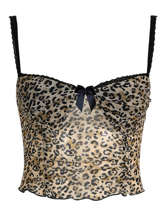 She pairs this 1980s Leopard Bow Crop Camisole with confidence and 1980s charm