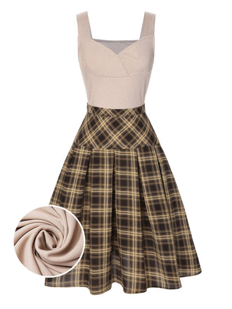 She pairs this 2PCS 1950s Beige Knitted Top & Plaid Pleated Skirt with confidence and 1950s charm