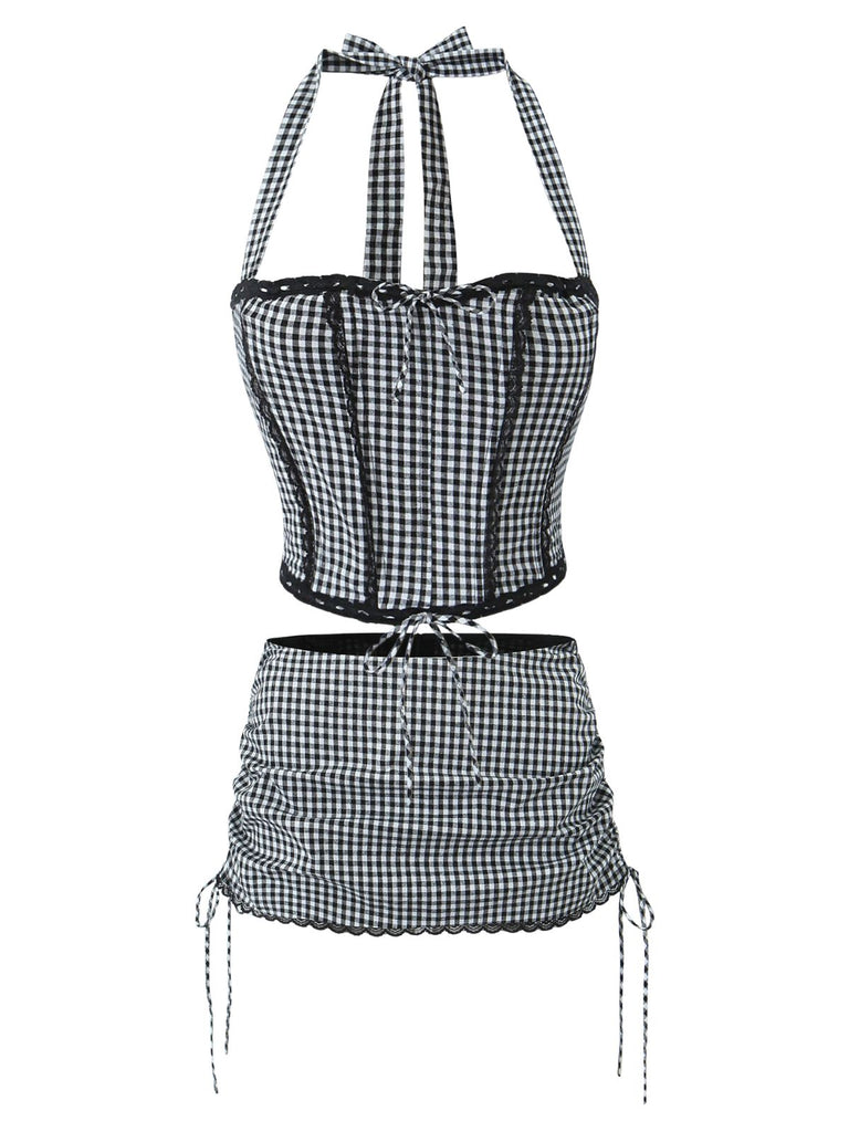 She pairs this 2PCS 1950s Gingham Plaid Lace-Up Crop Camisole & Skirt with confidence and 1950s charm