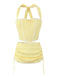She pairs this 2PCS 1950s Gingham Plaid Lace-Up Crop Camisole & Skirt with confidence and 1950s charm