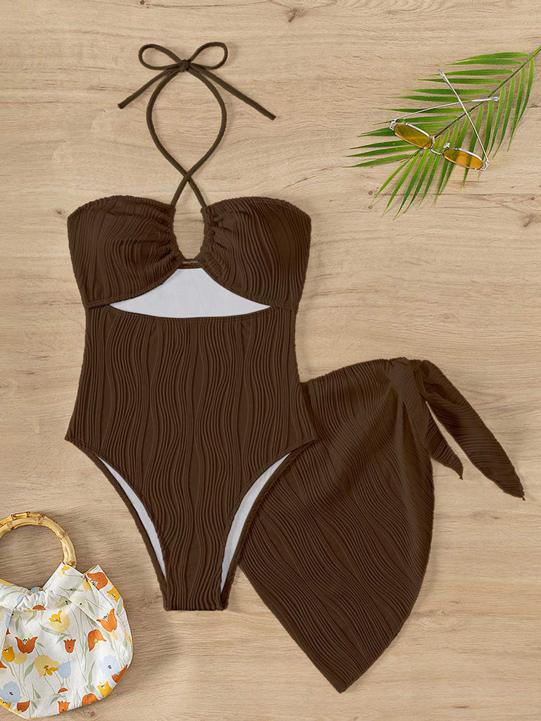 She's wearing 2PCS 1950s Lace-Up Halter Swimsuit & Cover-Up and the whole beach remembers the 1950s