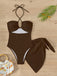 She's wearing 2PCS 1950s Lace-Up Halter Swimsuit & Cover-Up and the whole beach remembers the 1950s