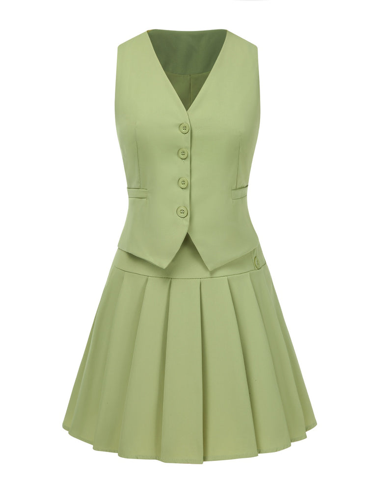 This 2PCS 1960s Solid Buttons Vest & Pleated Skirt spins 1960s stories with every step