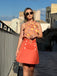 She pairs this 2PCS 1960s Tie Neck Floral Top & Button Solid Skirt with confidence and 1960s charm