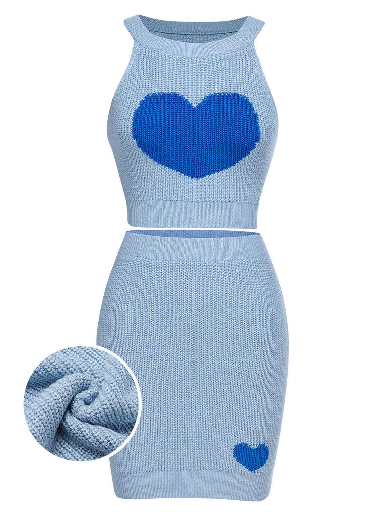 She pairs this 2PCS Blue 1960s Knitted Heart Cropped Top & Skirt with confidence and 1960s charm