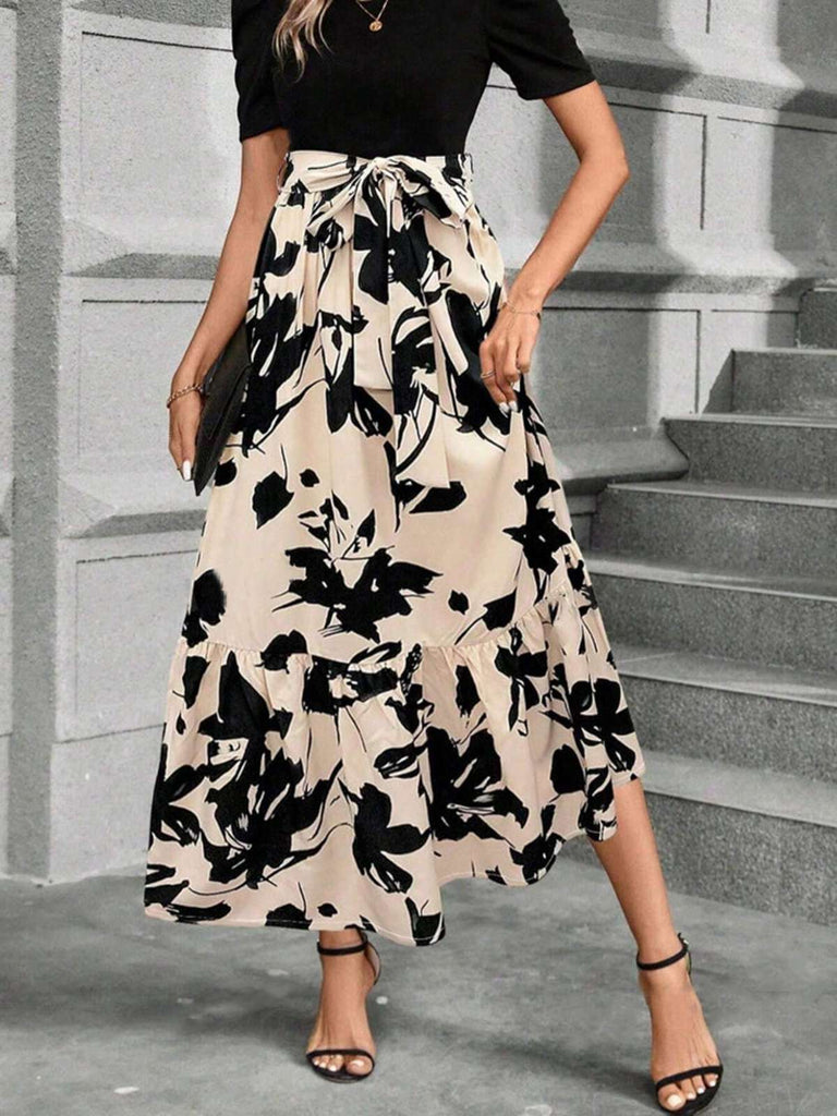 This Beige 1930s Floral Silhouette A-Line Skirt spins 1930s stories with every step