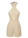 She finds her 1950s story in this Beige 1950s Texture Folds Cross Halter Romper