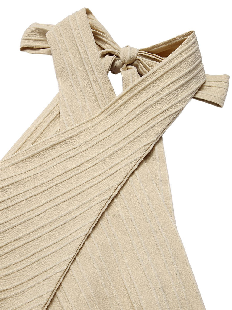 This Beige 1950s Texture Folds Cross Halter Romper whispers 1950s secrets to those who notice