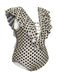This Beige 1960s Polka Dot Ruffles One-Piece Swimsuit carries 1960s vacation dreams in every stitch