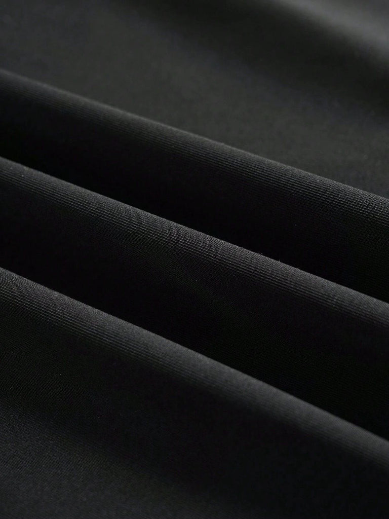 Black 1930s Solid Spaghetti Strap Mermaid Dress — a 1930s silhouette that turns sidewalks into runways