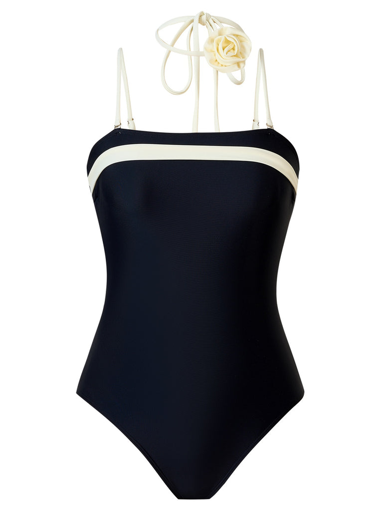 This Black 1940s Contrast 3D Rose Belted Swimsuit carries 1940s vacation dreams in every stitch