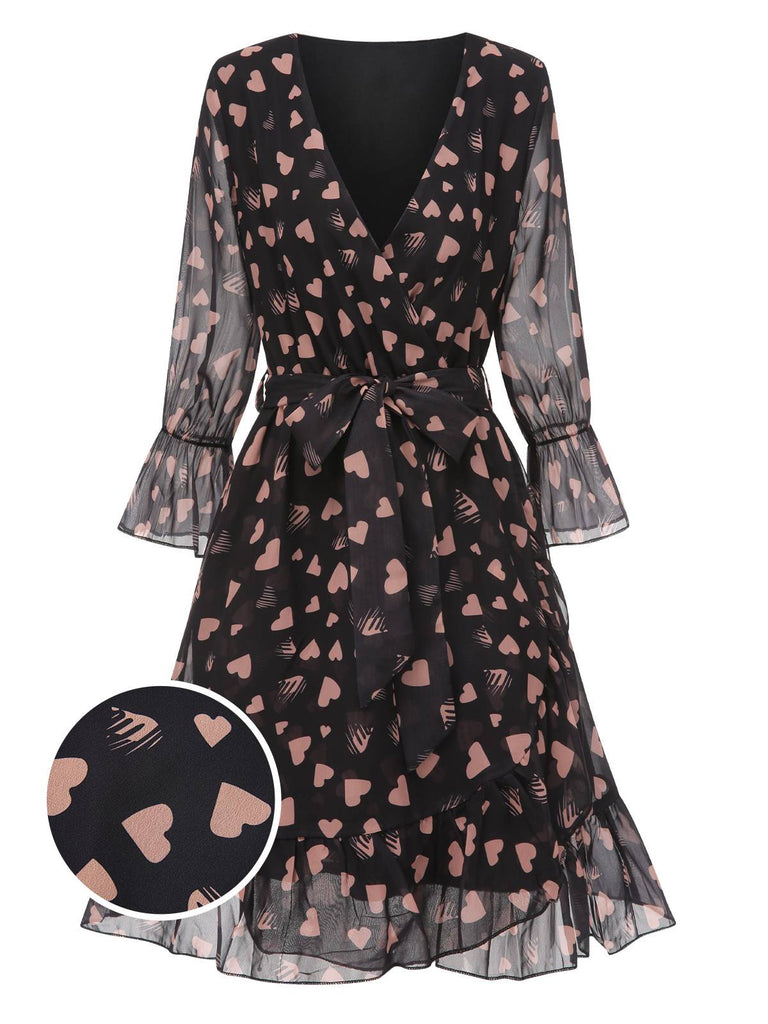 She slips into this Black 1940s Heart Sheer Sleeves Wrap Dress and suddenly it's a 1940s daydream