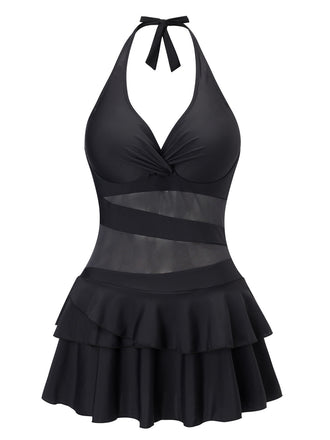She slips into this Black 1940s Layered Hem Halter Swimdress and suddenly it's a 1940s daydream