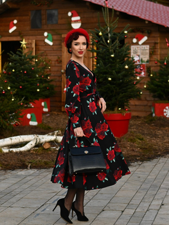 She slips into this Black 1940s Rose Lantern Sleeved Lace-Up Dress and suddenly it's a 1940s daydream